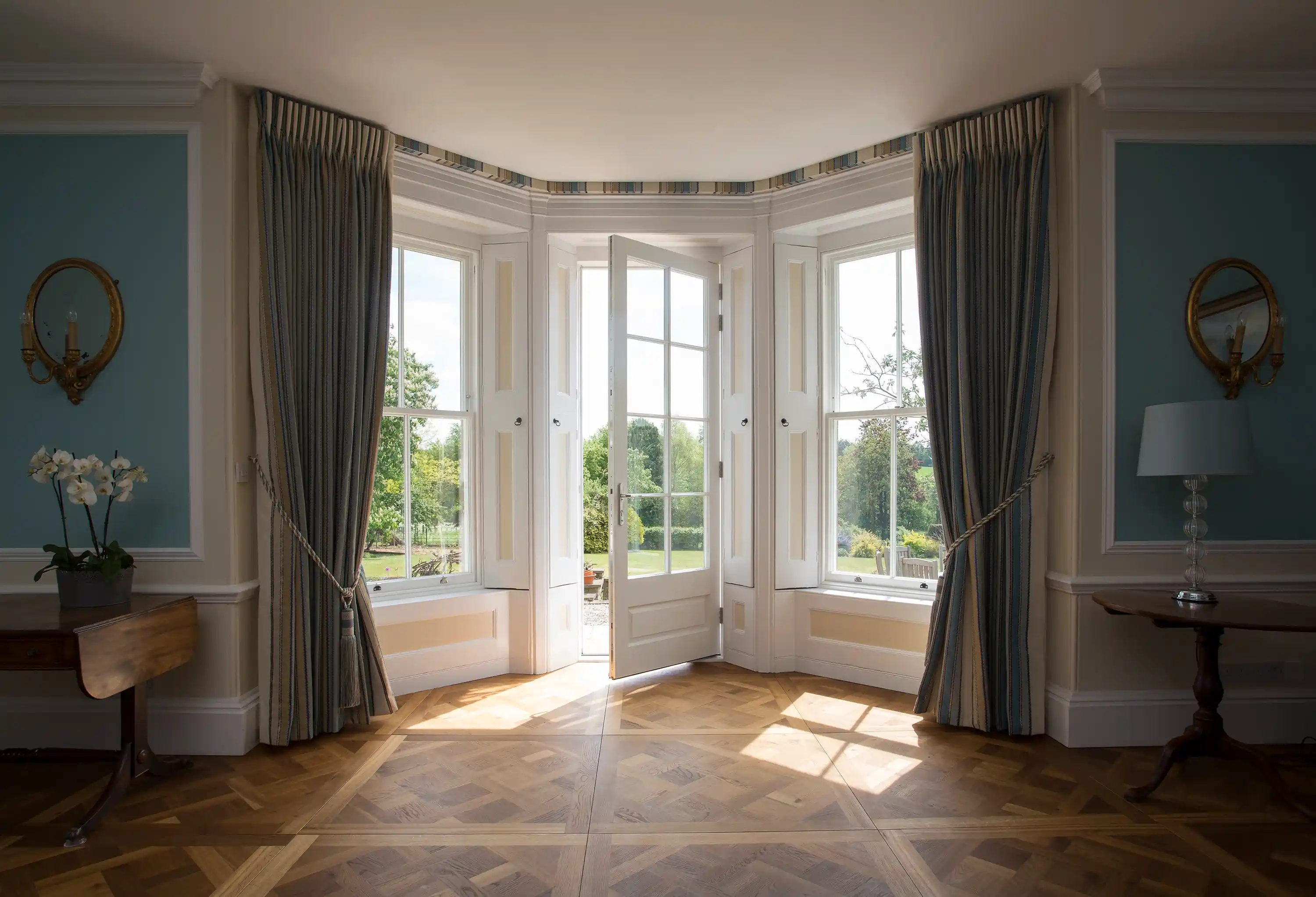 Accoya timber bay sash windows and French door in a period property