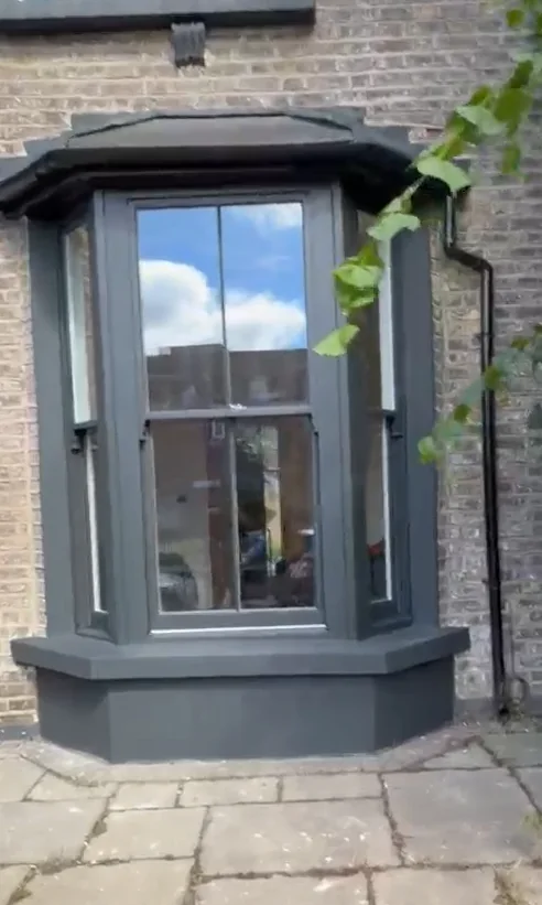 Ground-floor Accoya bay sash window in Little Greene Lamp Black, Hackney E8