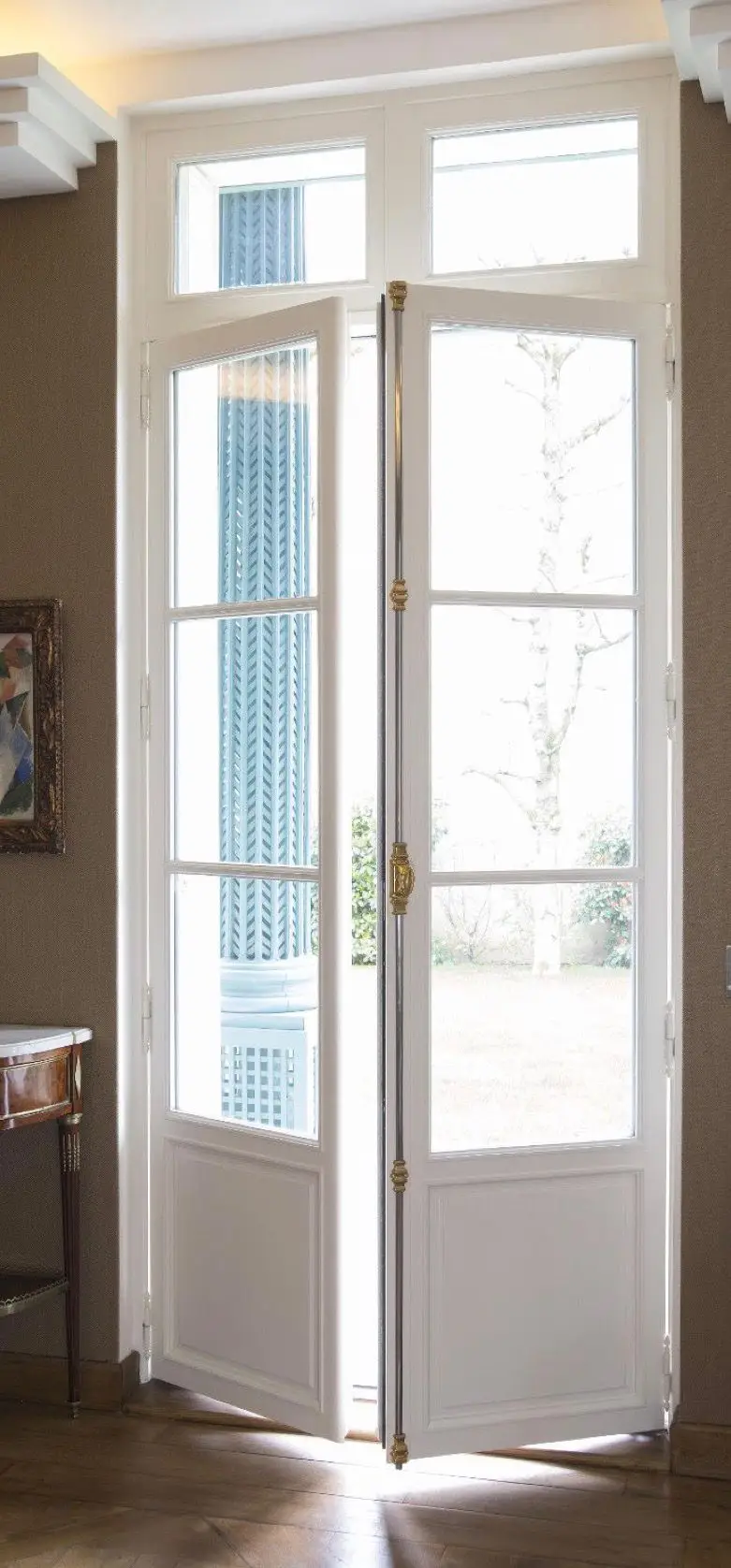 Timber French door installation opening onto a London garden