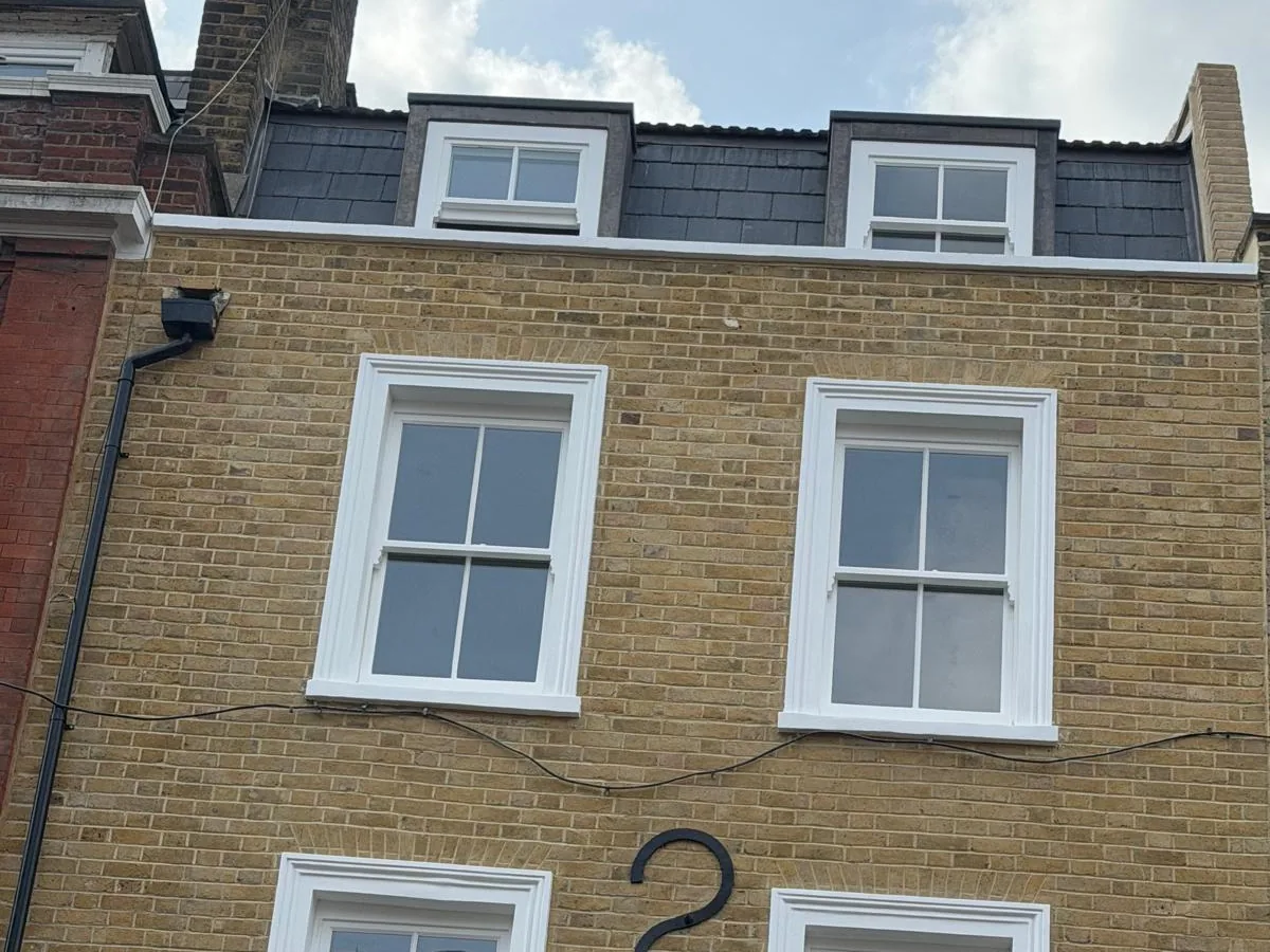 Heritage glass sash windows in Hackney — slim-profile double glazing on a restored period building