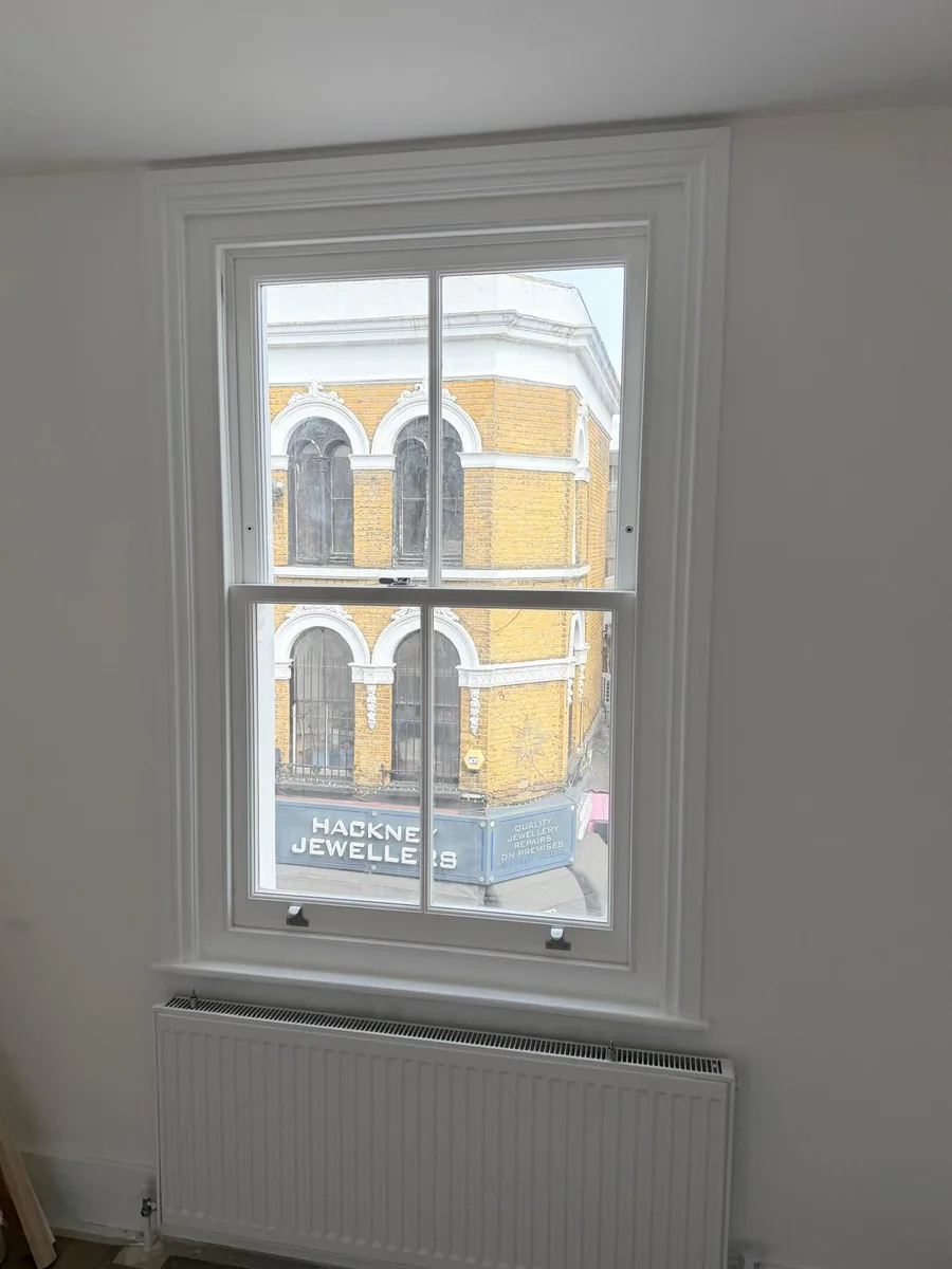 Finished heritage glass sash window in a completed Hackney flat