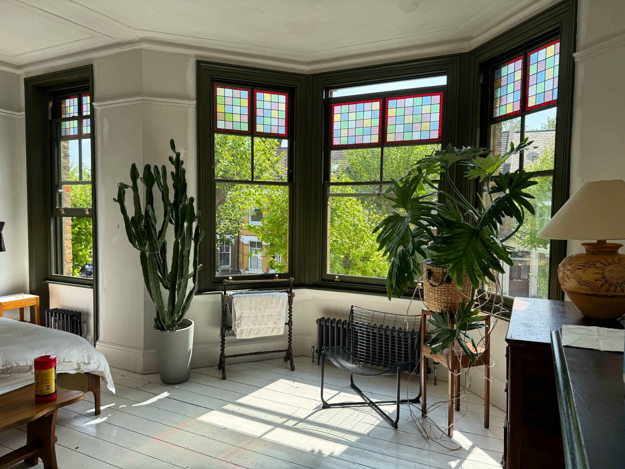 Bespoke timber sash windows with stained glass in a Victorian home in Finsbury Park London