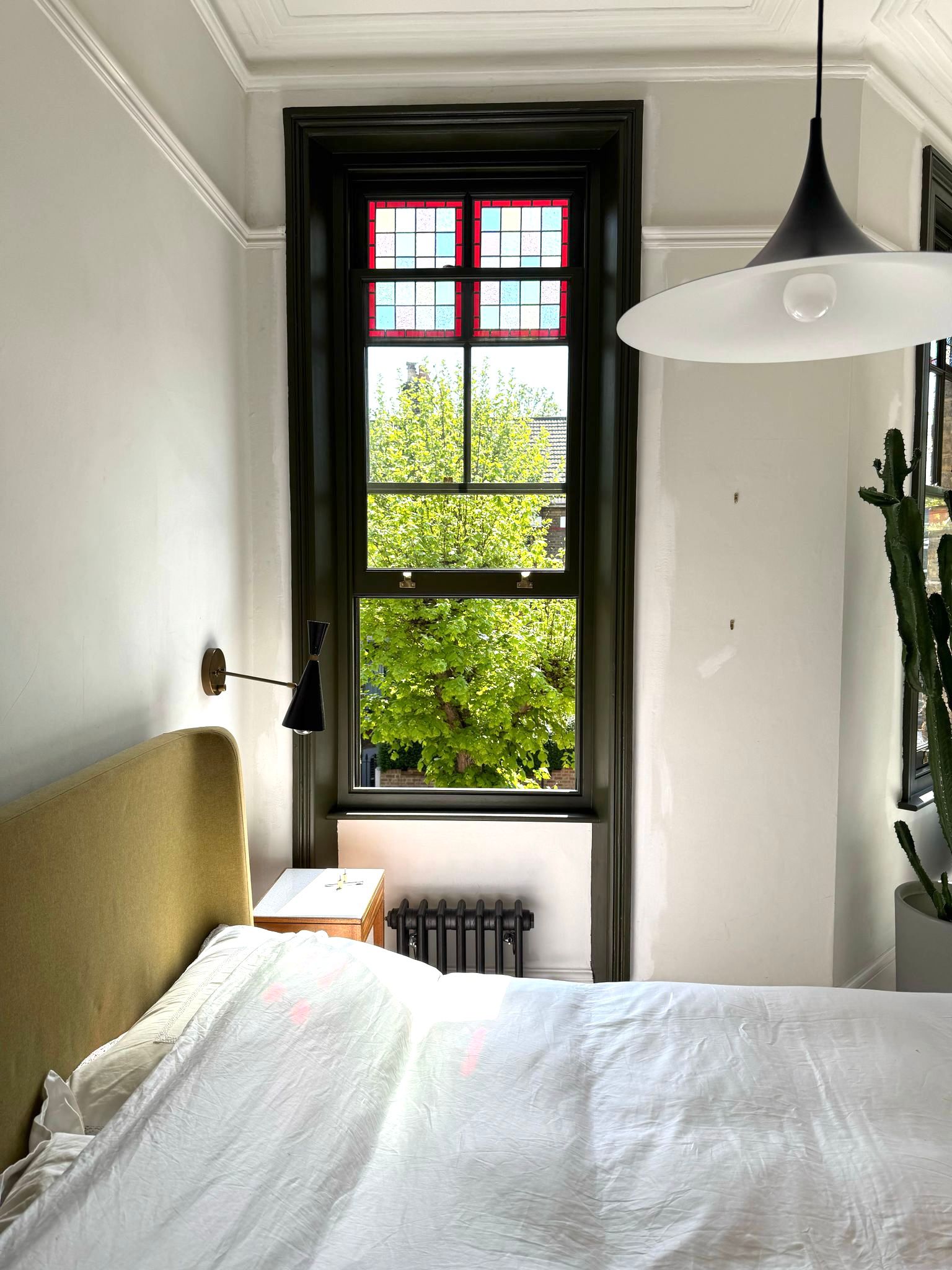 Custom timber sash window installation with stained glass in Finsbury Park North London